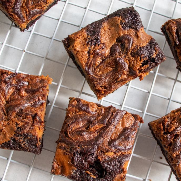 Pumpkin brownies on a wire rack