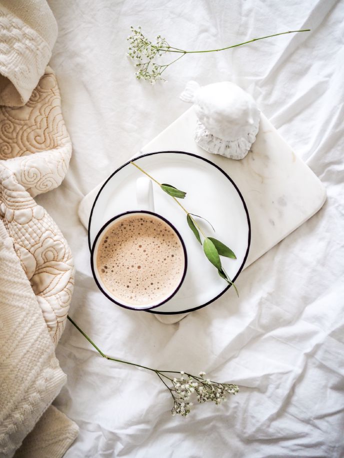 Starbucks London Fog Tea Latte on a table with flowers