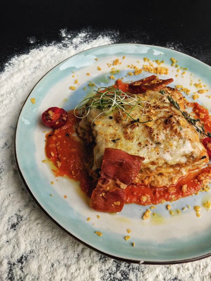 Portion on vegan lasagna on a plate