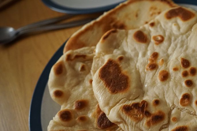 Close up of sourdough naan bread